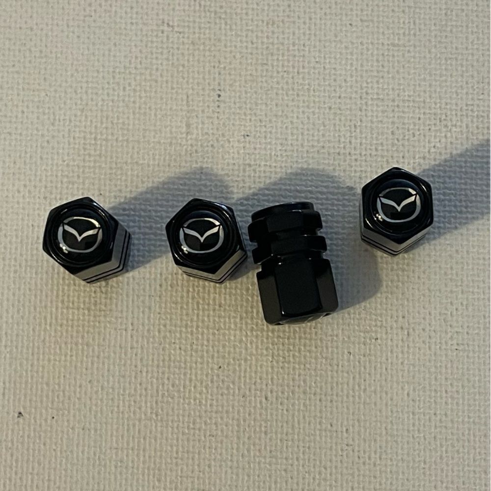 Mazda valve Stem caps in Black set of 4 NWT